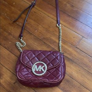 Red Michael Kors cross Cody bag